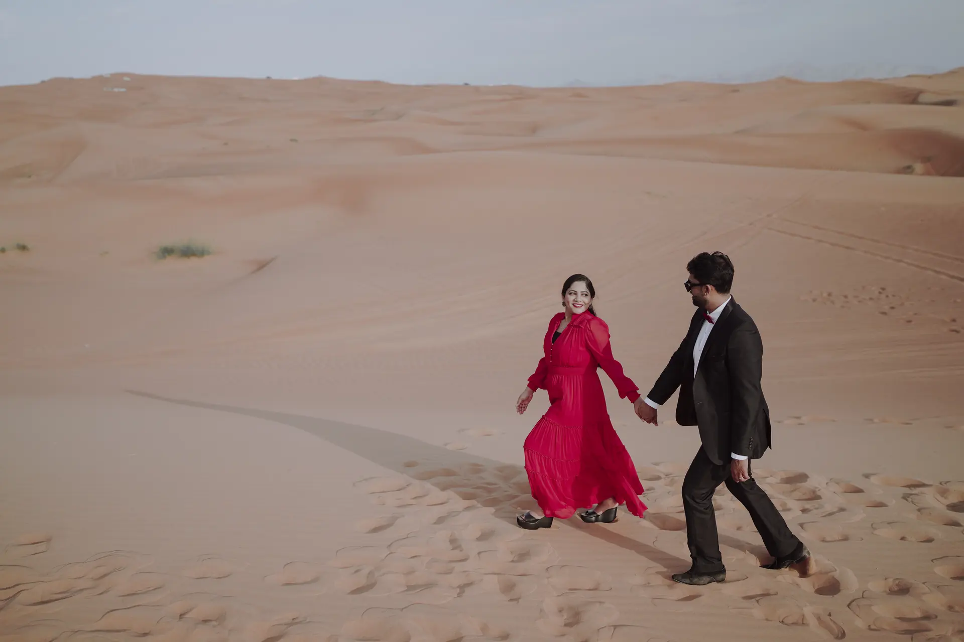 Pre-wedding shoot in the Dubai desert at golden hour